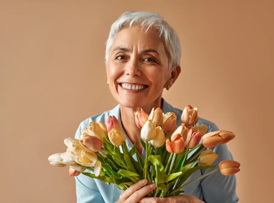 Woman discussing menopause with her clinician via telehealth
